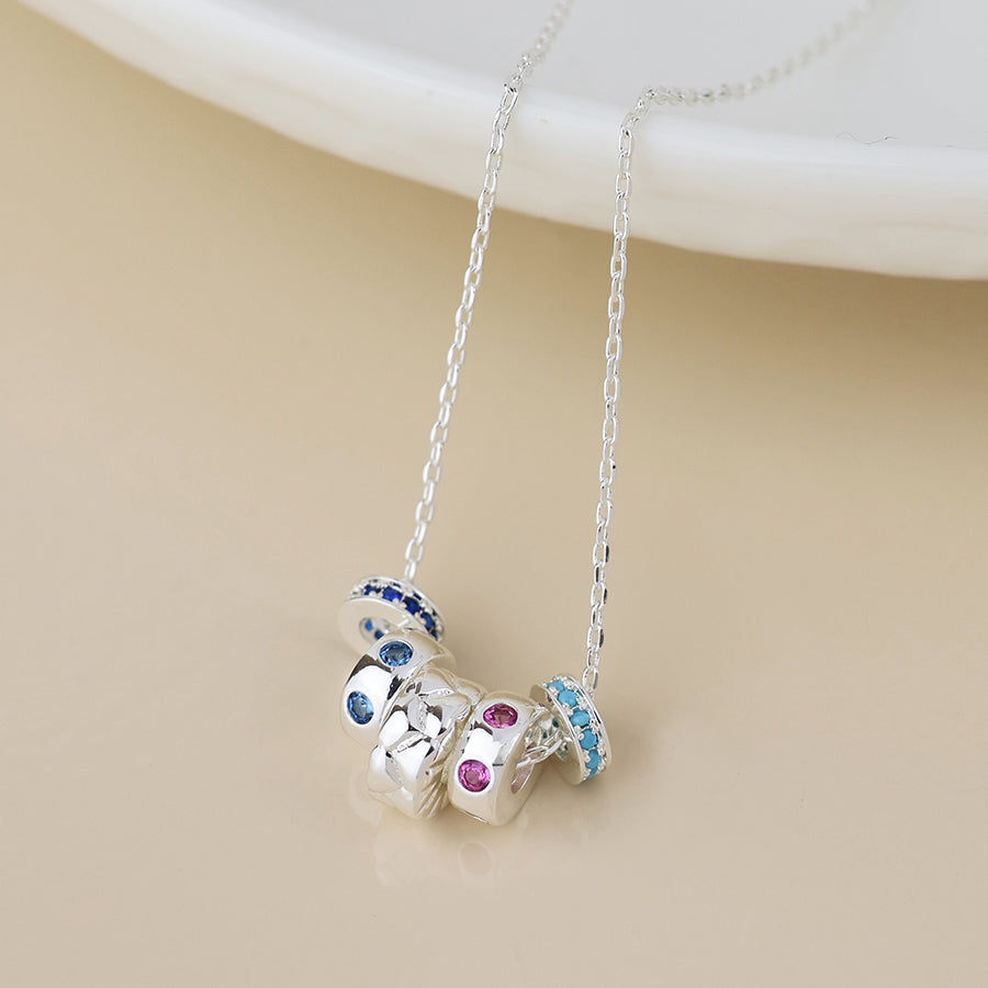 Silver plated five ring necklace with crystals
