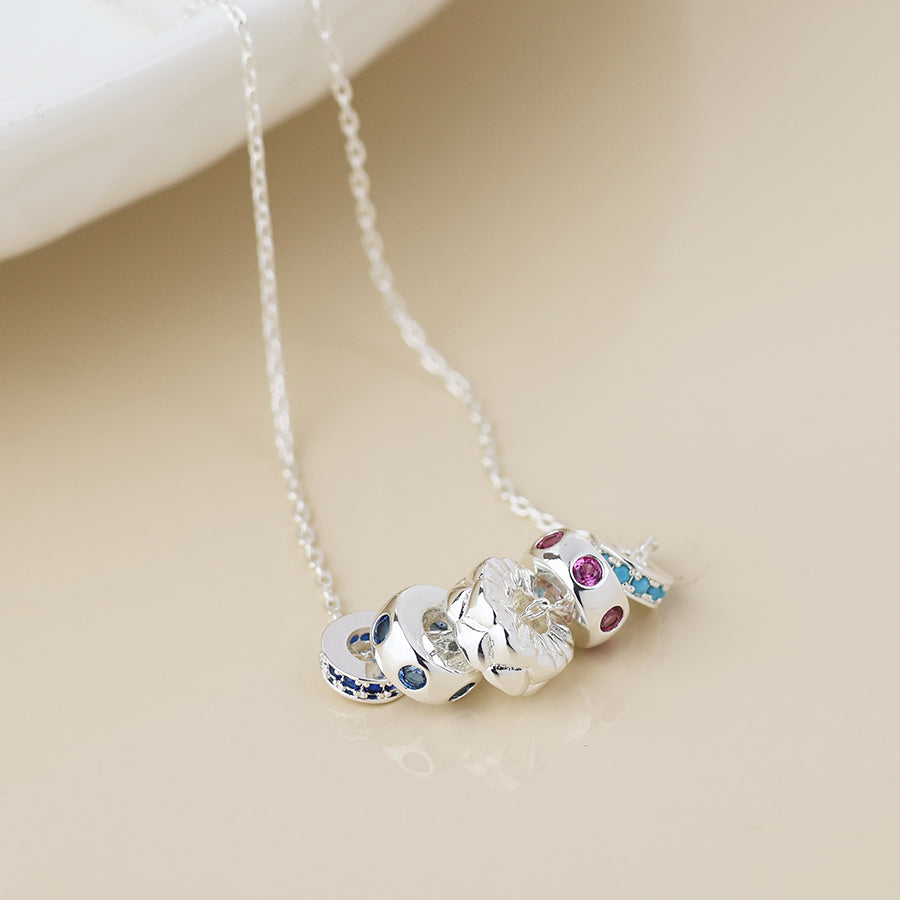 Silver plated five ring necklace with crystals
