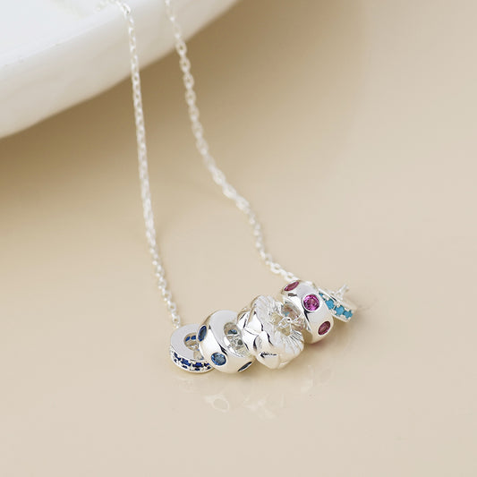 Silver plated five ring necklace with crystals